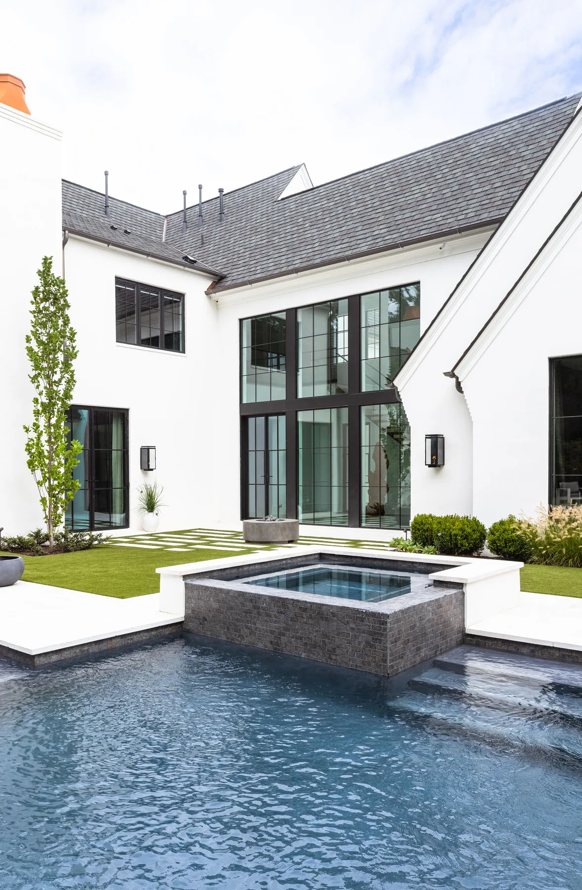 Outdoor pool courtyard at the Cloisters custom residence