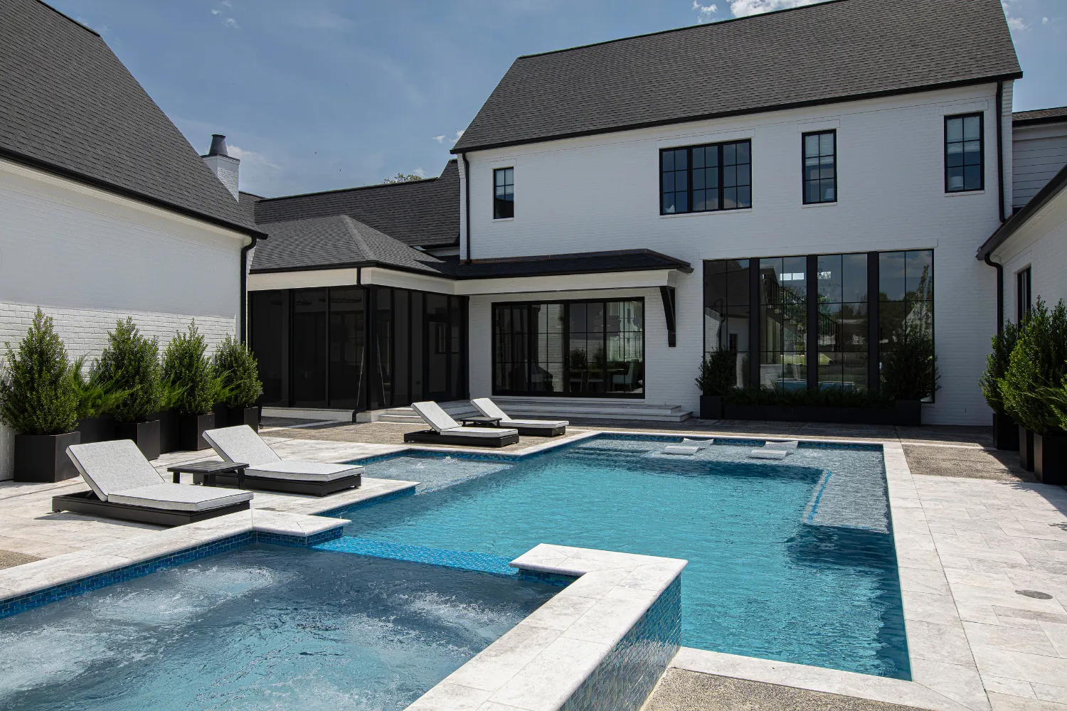 Williamson Residence pool and spa beside the custom home