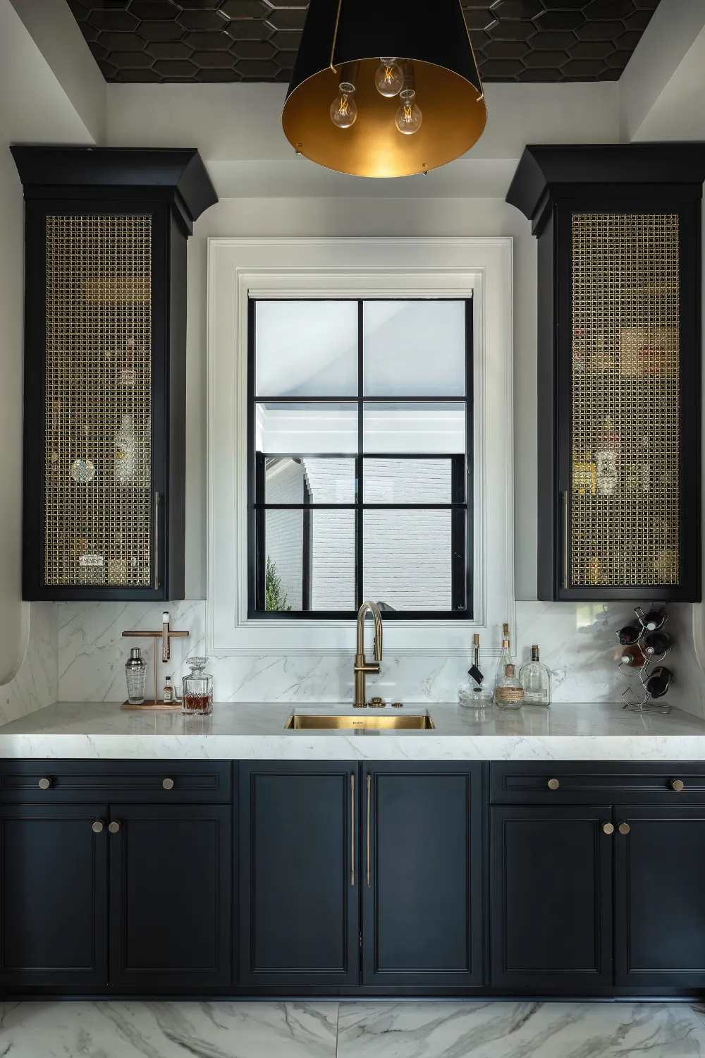 Williamson Residence bathroom with contrasting dark vanity and bright tile