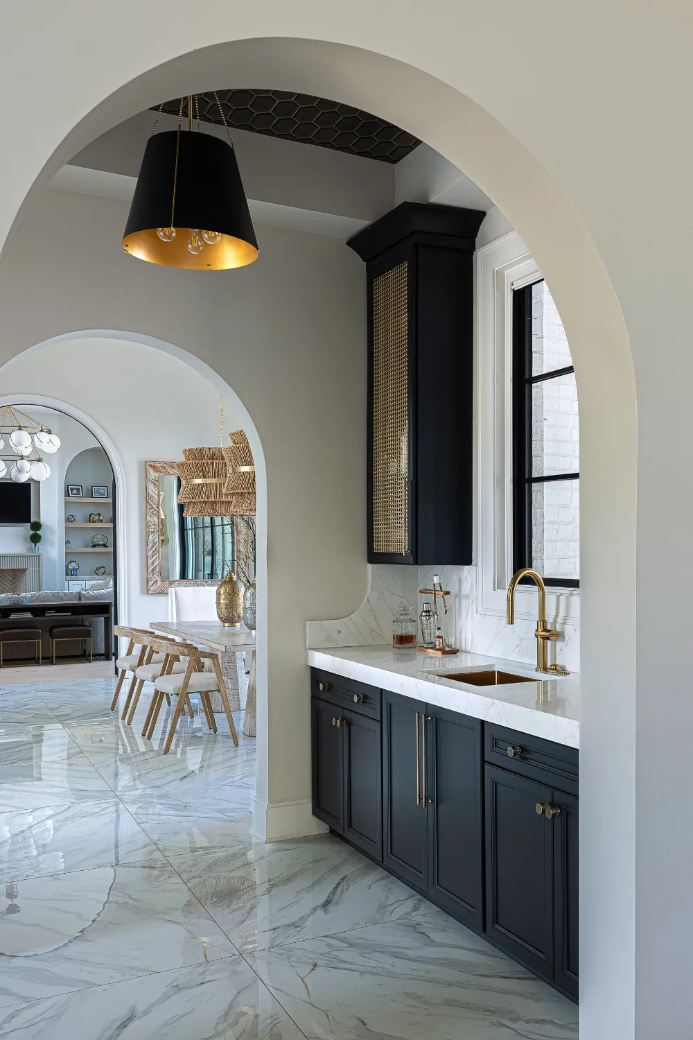Open doorway framing the kitchen at the Williamson Residence